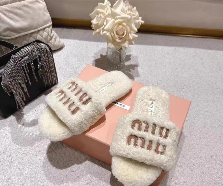 Off white fuzzy flats