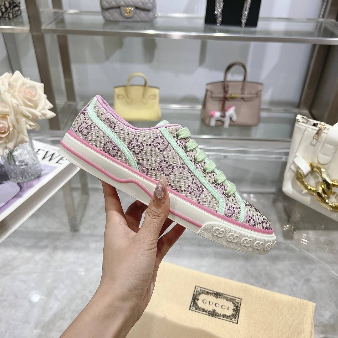 Purple bedazzled tennis shoes