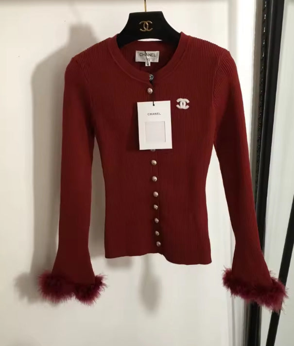 Red Cardigan with feathers