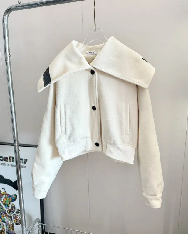 Off white coat with black detail