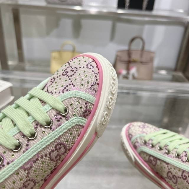 Purple bedazzled tennis shoes