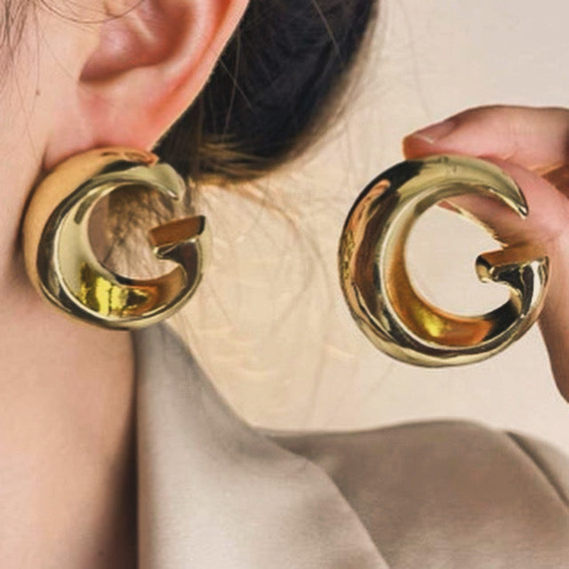G earrings