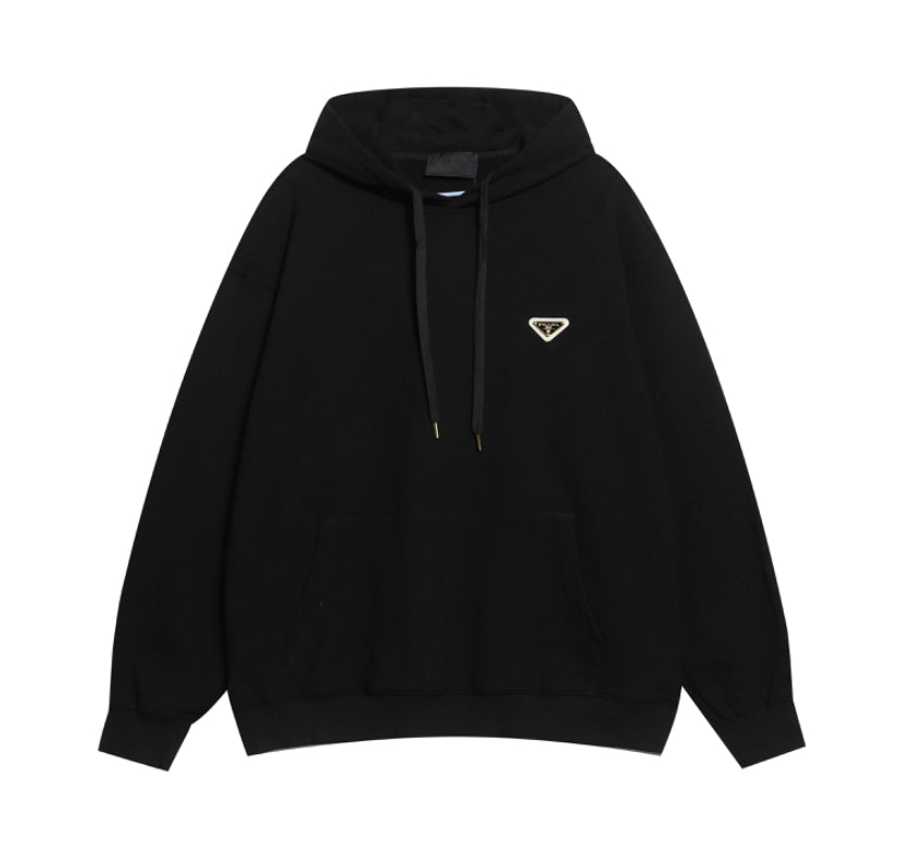 Oversized hoodie with gold accessories