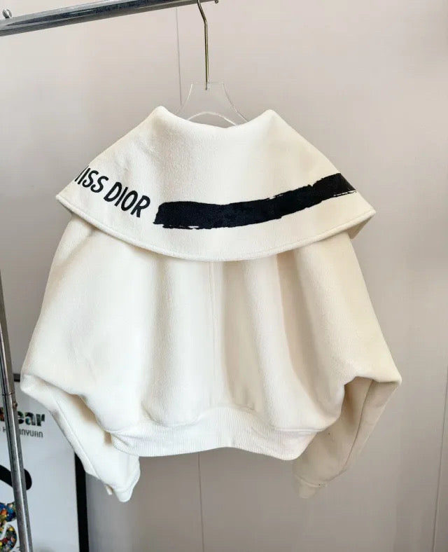 Off white coat with black detail