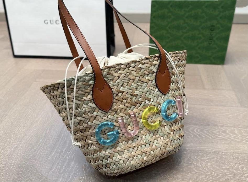 Rattan purse with leather straps