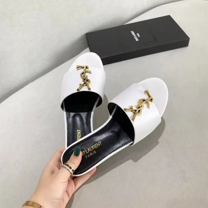Leather flats with gold hardware