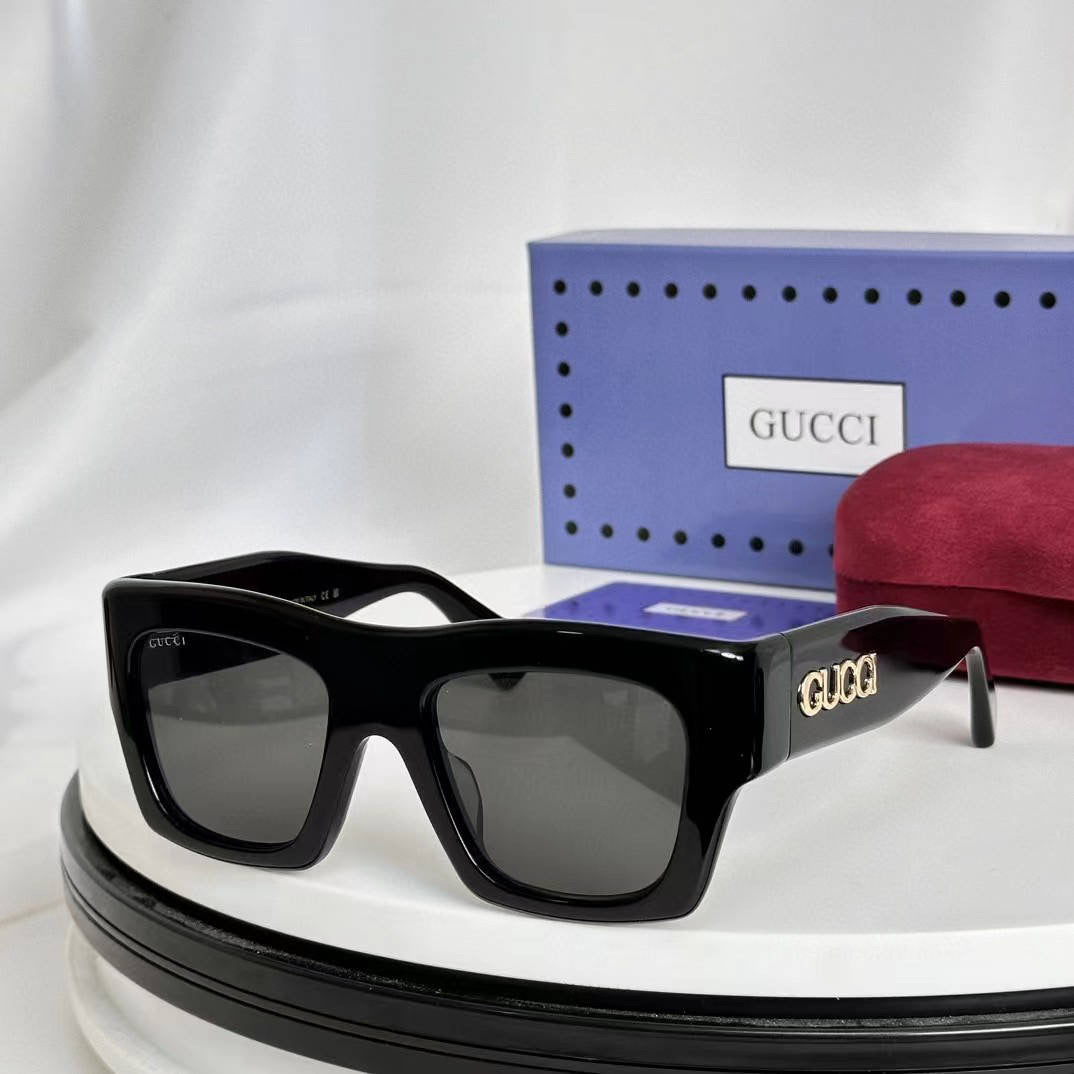 Thick black sunglasses