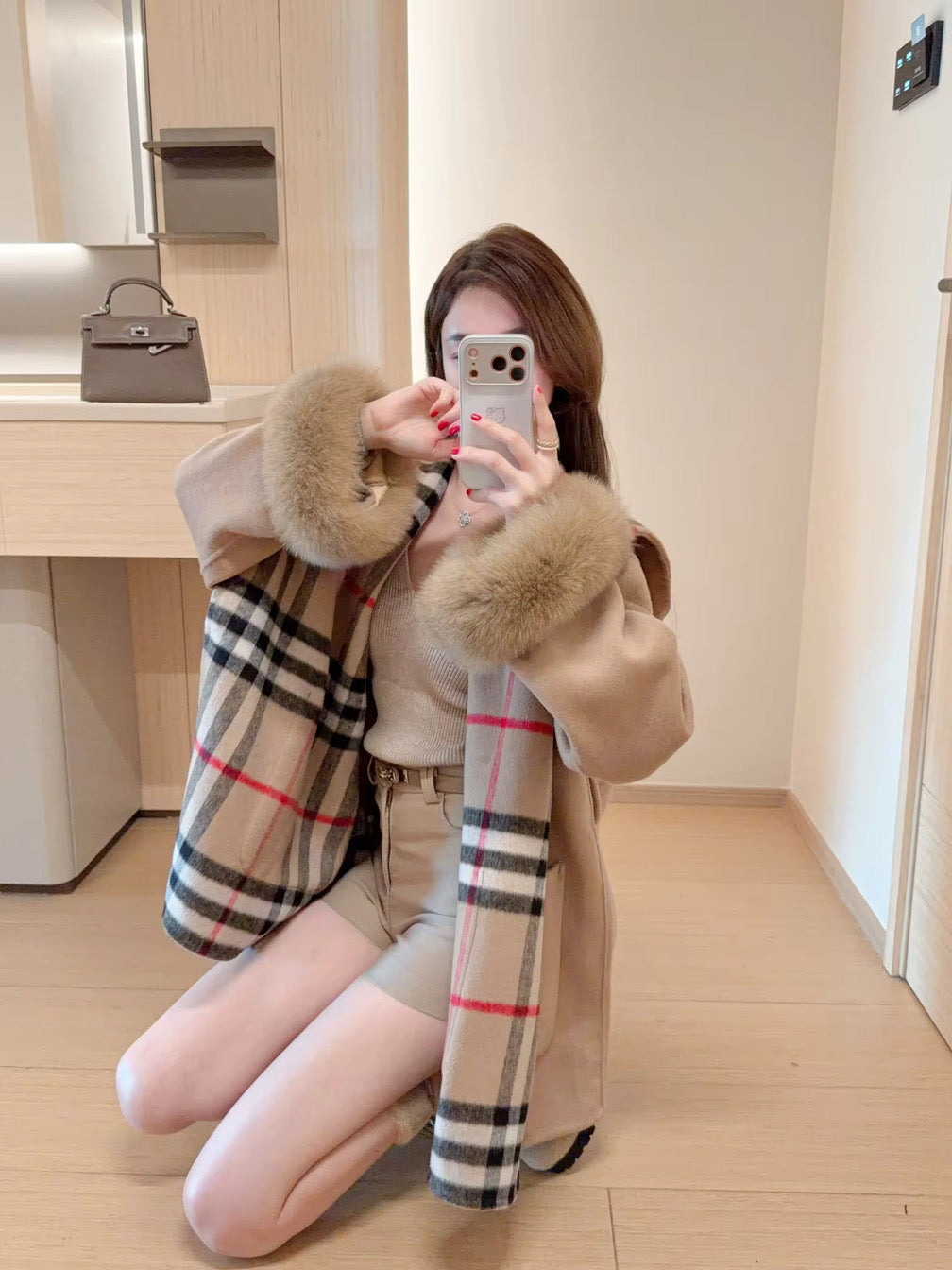 Stripped pullover with fur