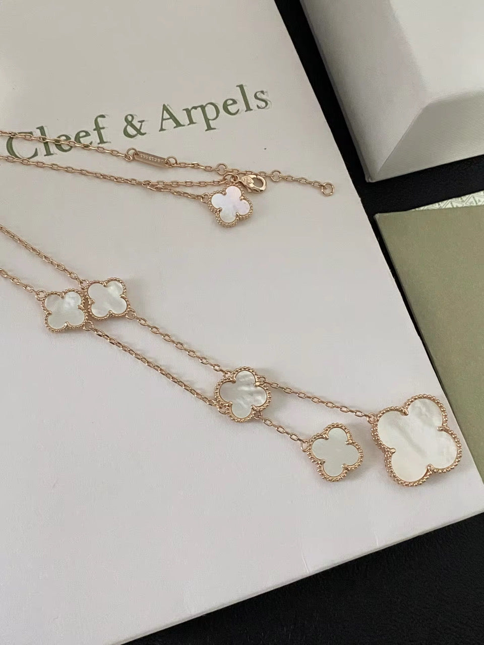 Long Gold Necklace with white pearl design