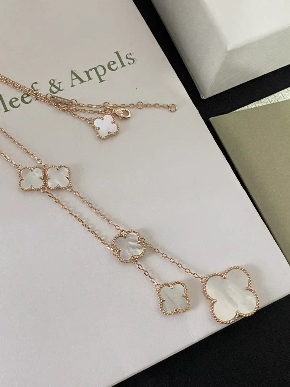 Long Gold Necklace with white pearl design