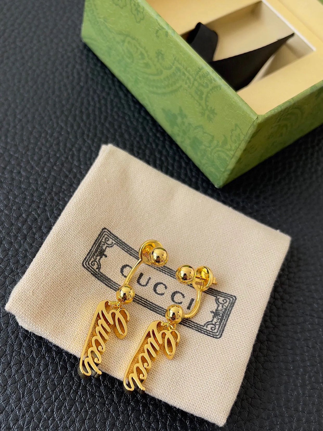 Gold hanging earrings