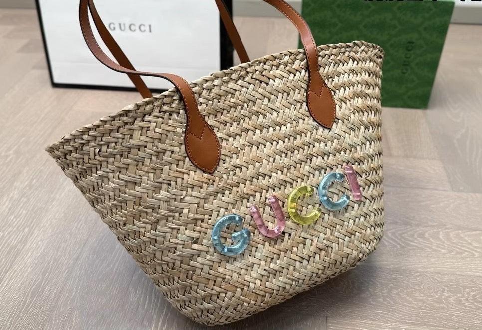 Rattan purse with leather straps