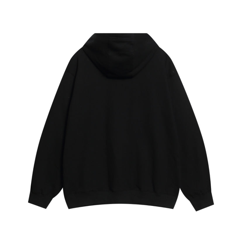 Oversized hoodie with gold accessories