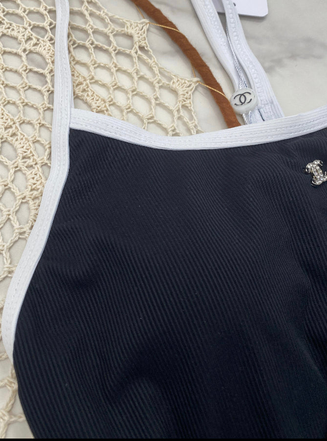 Black one piece with white lining