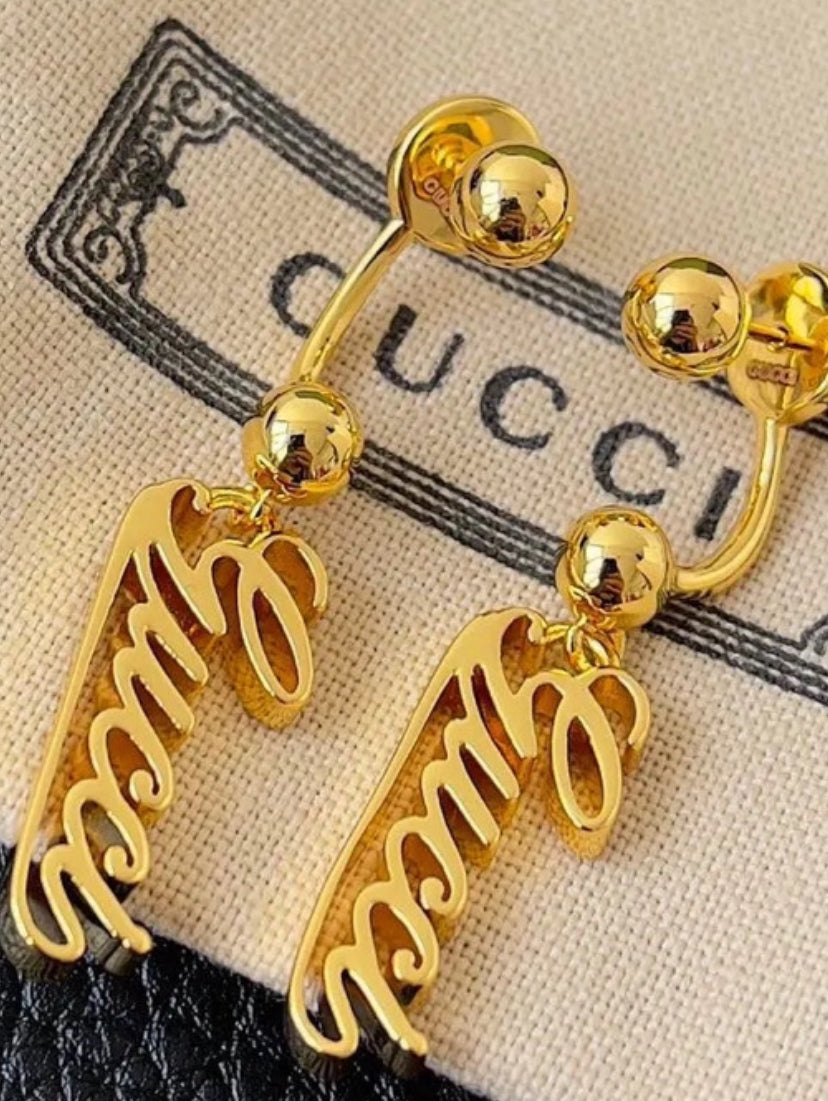 Gold hanging earrings