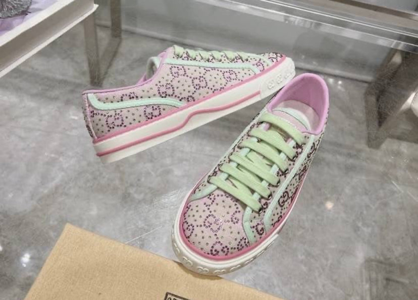 Purple bedazzled tennis shoes