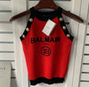 Black or red tank with buttons