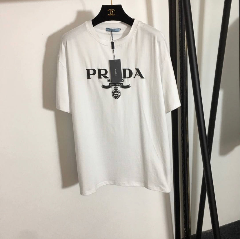 White t shirt with black writing