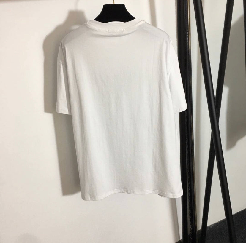 White t shirt with black writing