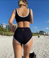 High waisted black bathing suit