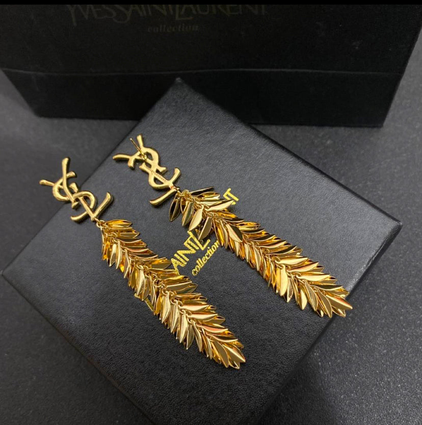 Pendientes largos colgantes de oro